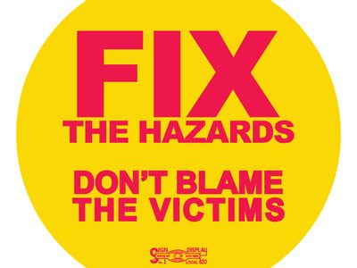 Round yellow Fix the Hazards safety decal printed by Carroll Printing & Promotions